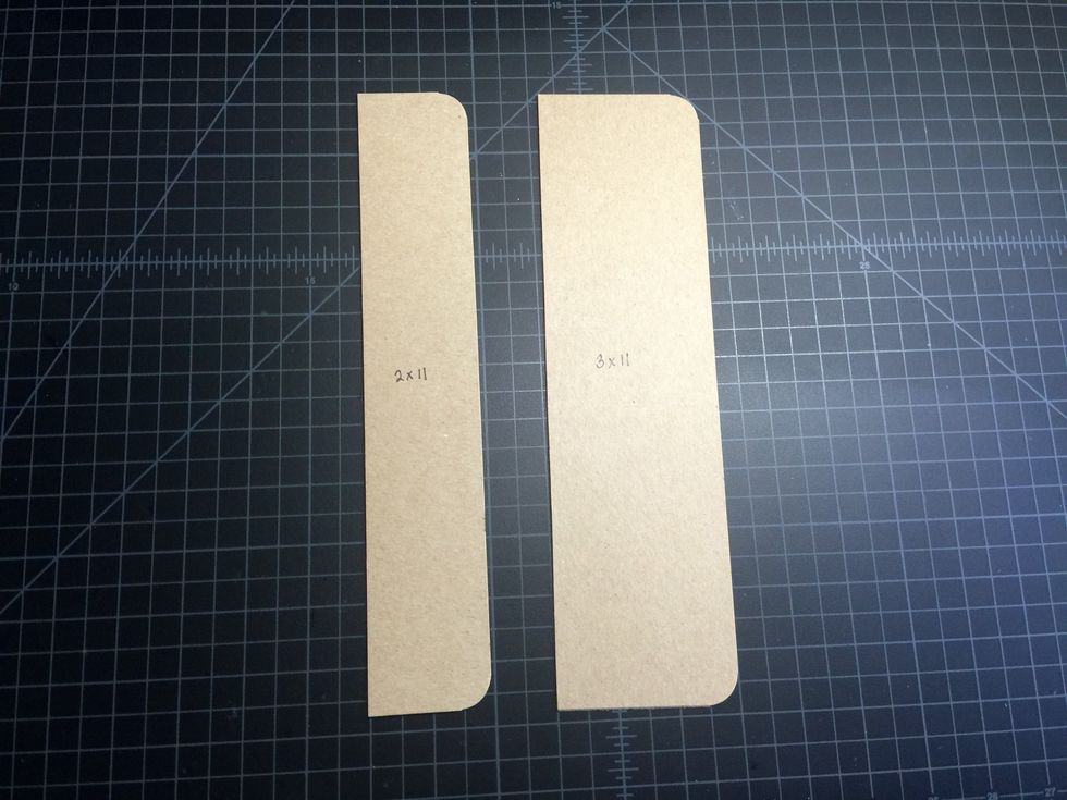 You'll also need 2 strips of chipboard for your portfolio flaps: (1) 2" x 11" and (1) 3" x 11". Use your Corner Chomper to round the edges as shown.