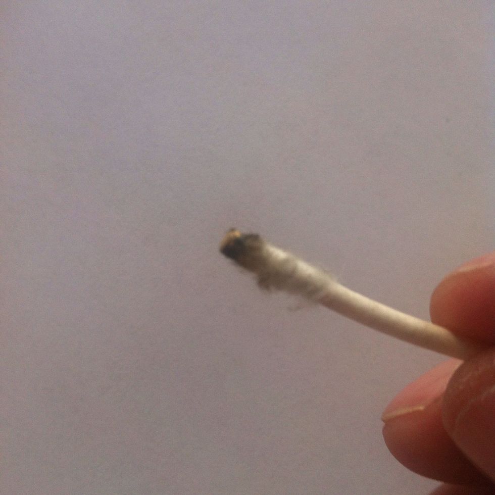 You'll be amazed at how much dust might be caked up in there. You could add a little rubbing alcohol to the Q-tip but make sure your phone is turned off and let it dry for a minute before turning on.