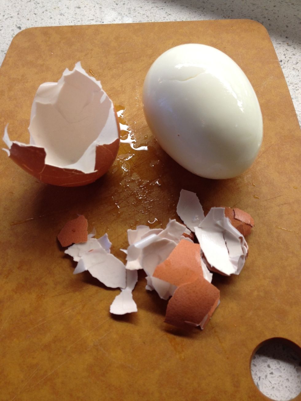 You'll find that the shell will eventually just fall away with minimal effort.