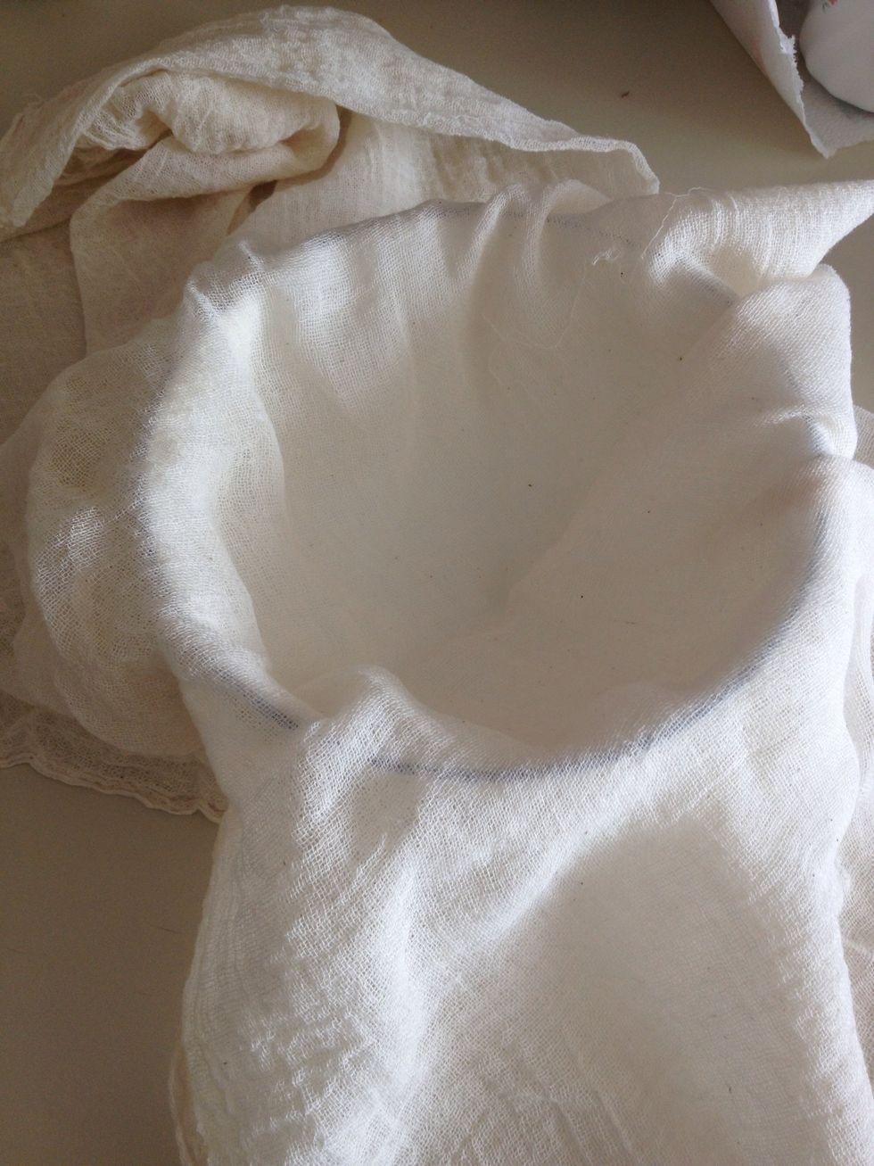 You'll need a cheesecloth or a muslin cloth for this. Spread the cloth over a bowl,