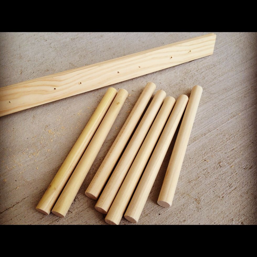 You'll need a flat wooden stick and rods. Measure your shelf for the length of the rack. I got a 30" wood strip. I got three 48" circular rods and got them cut to 8" pieces at Lowes