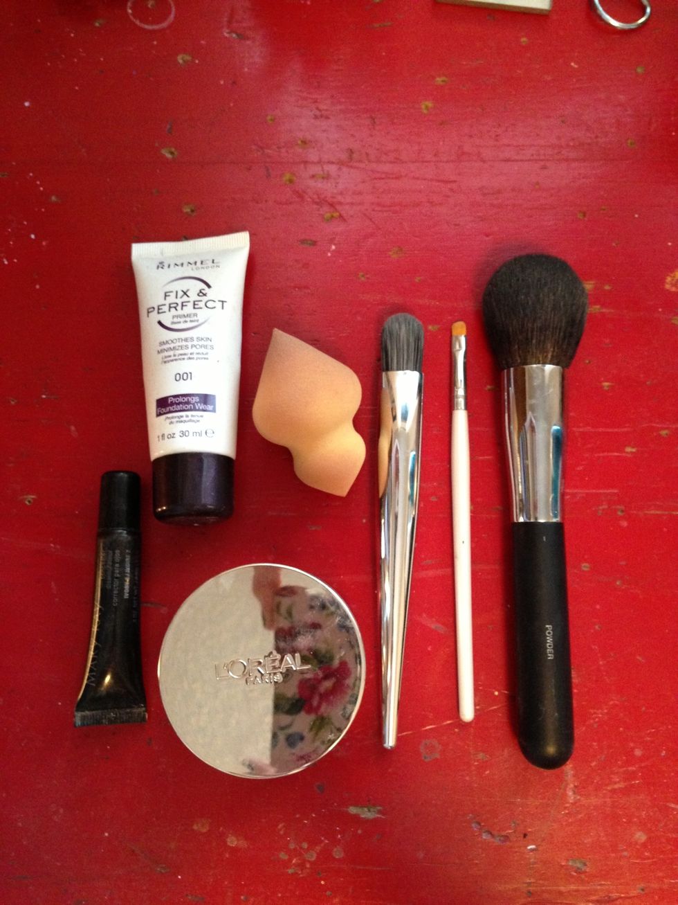 You'll need a primer, concealer (that's either one shade lighter or darker, depending if the scarring is raised or pitted), foundation, brushes and a sponge.