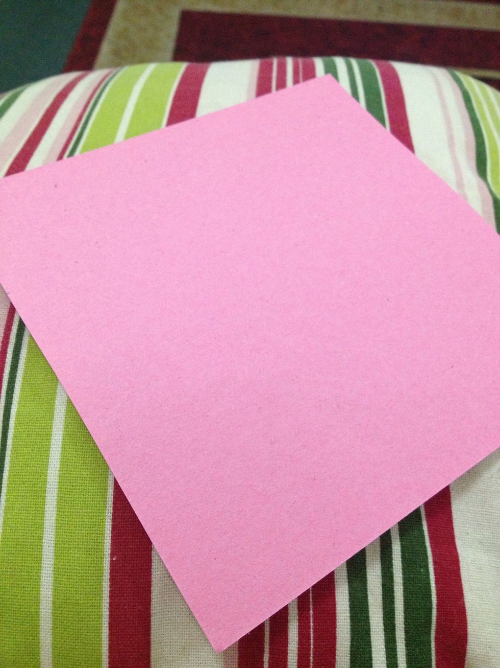 You'll need: A square colored paper. Any color of your choice will do.