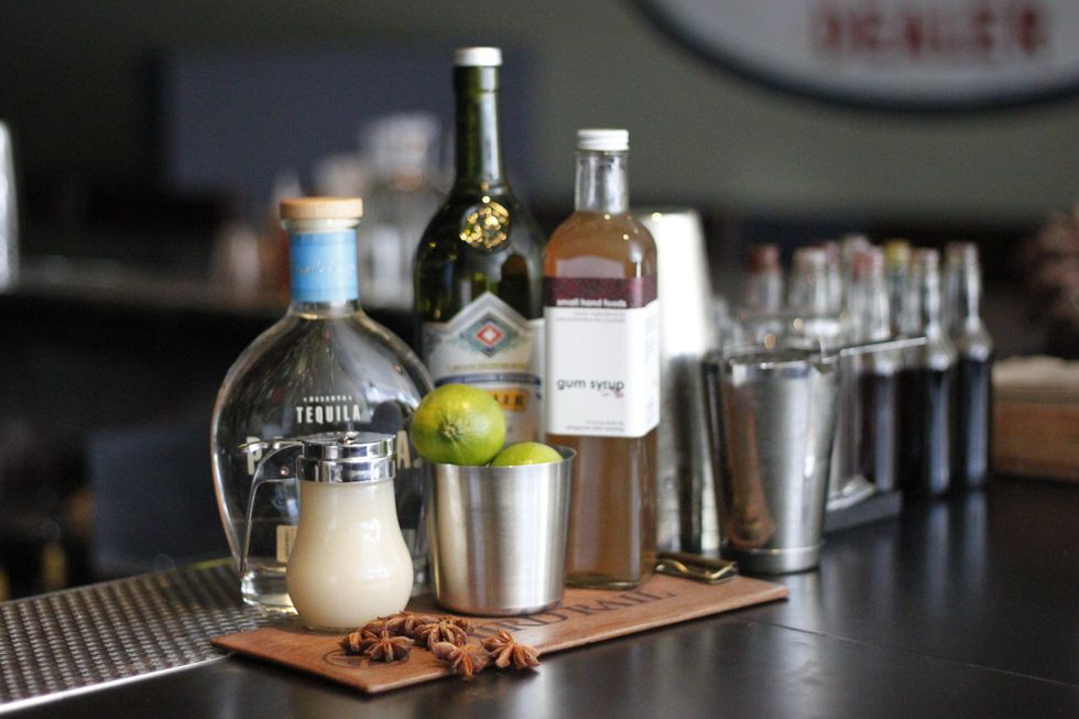 You'll need asian pear/anise puree, Partida Blanco Tequila, lime juice, gum syrup, a shaker, double strainer, and a spray bottle for absinthe.