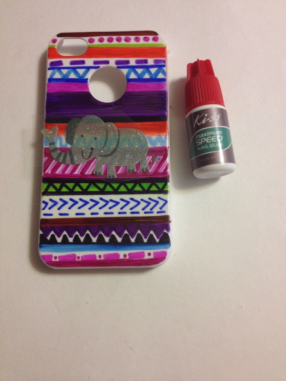 You'll need nail glue OR super glue.