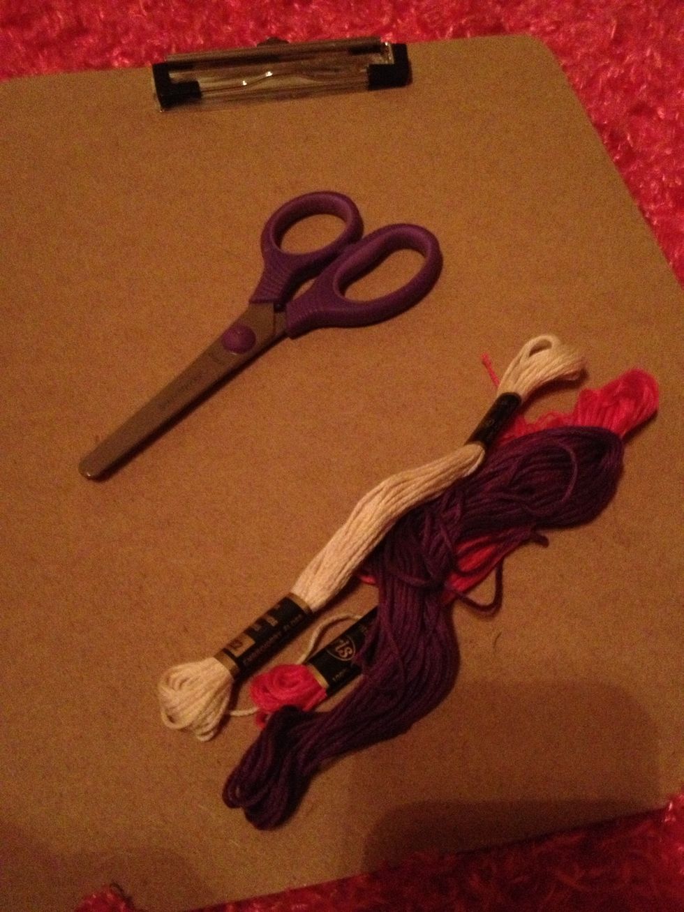 You'll need three colors of thread, a clipboard and scissors