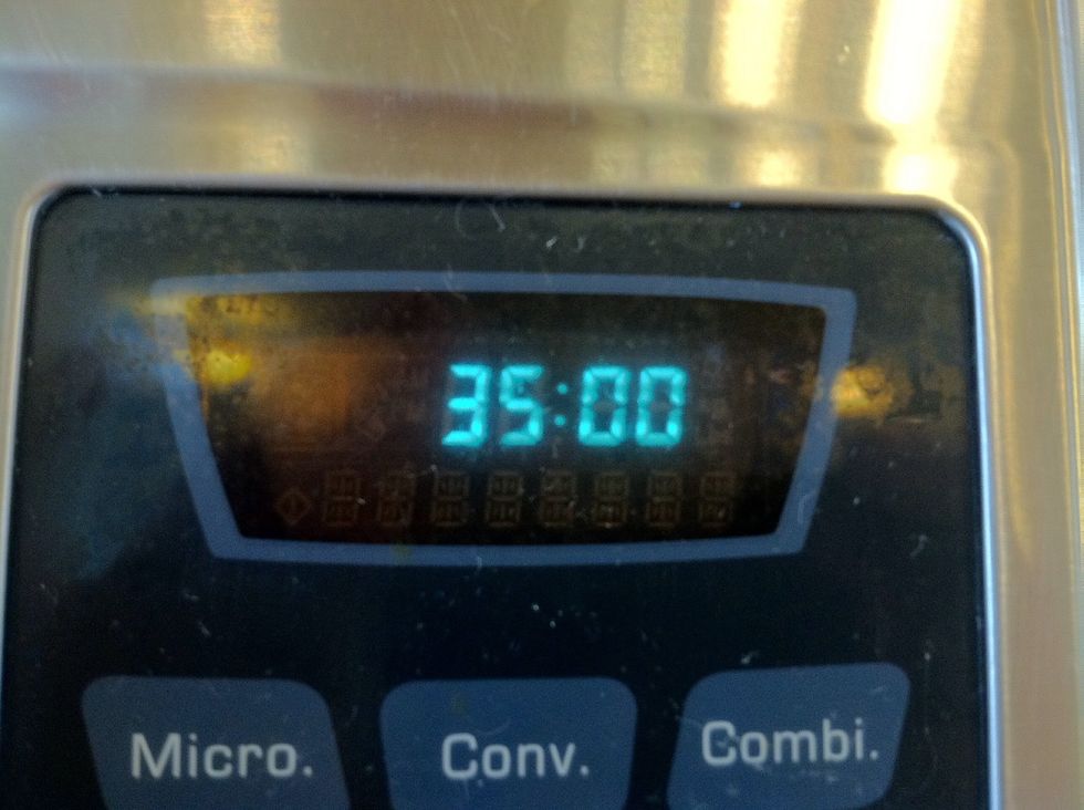 You'll need to put the batter into the oven for 35 minutes.  However, you may need to bake the cake slightly longer than this.