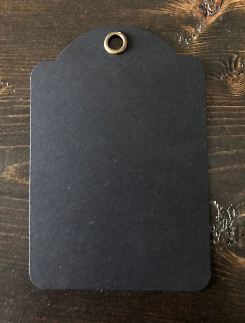 You'll need to take one Black Tag out of the Regular Tag Album - Black package.