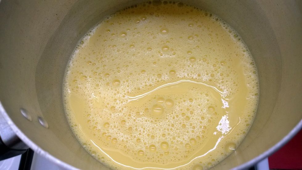 You'll see bubbling everywhere and your custard changing colour and coming together nicely. And yes it takes quite a while to thicken up but I promise you it'll be worth the effort. Keep stirring..
