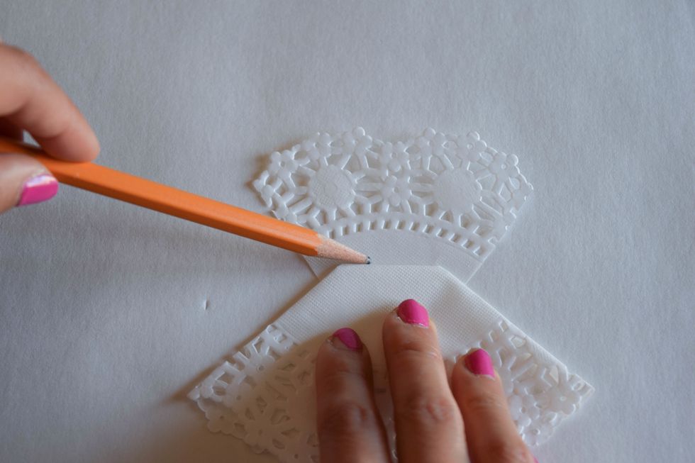 You'll see that the bodice of your dress is larger than the waist of the skirt. Note how much to trim off the sides of the bodice so it aligns with the waist line of the skirt.