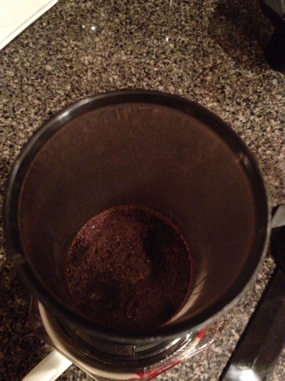 You'll see them "bloom" and release a strong coffee aroma. Wait about 15 seconds and continue to pour in the rest of the water.