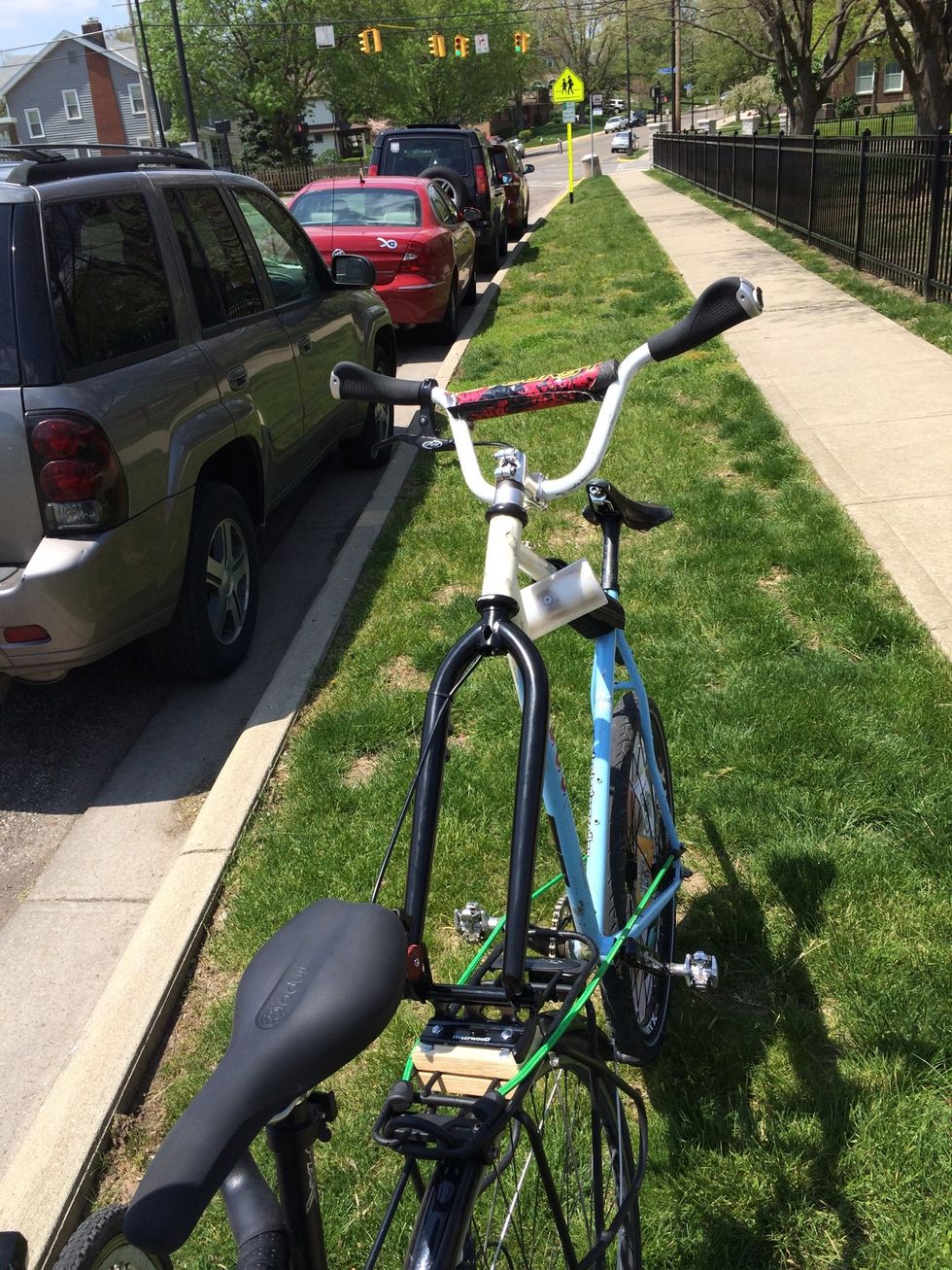 You'll then take two bungee cables and hook them from your rear rack to the rear drop outs on the bike you're trailing. This is for stability. I would also bungee your front wheel to the rack