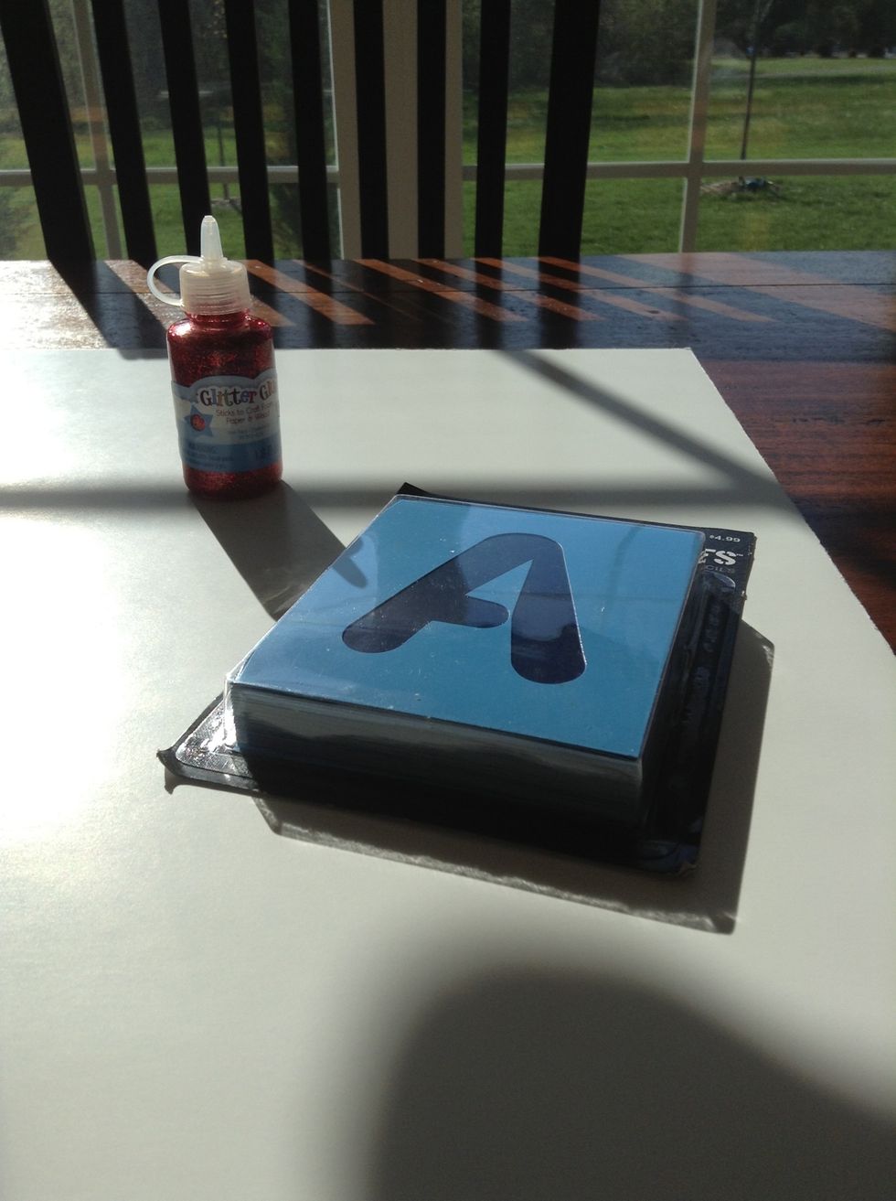 You'll want to add a big statement in large letters. Since I am going to a Taylor Swift concert next Saturday I will be using red glitter glue to outline the stencils and make the letters.