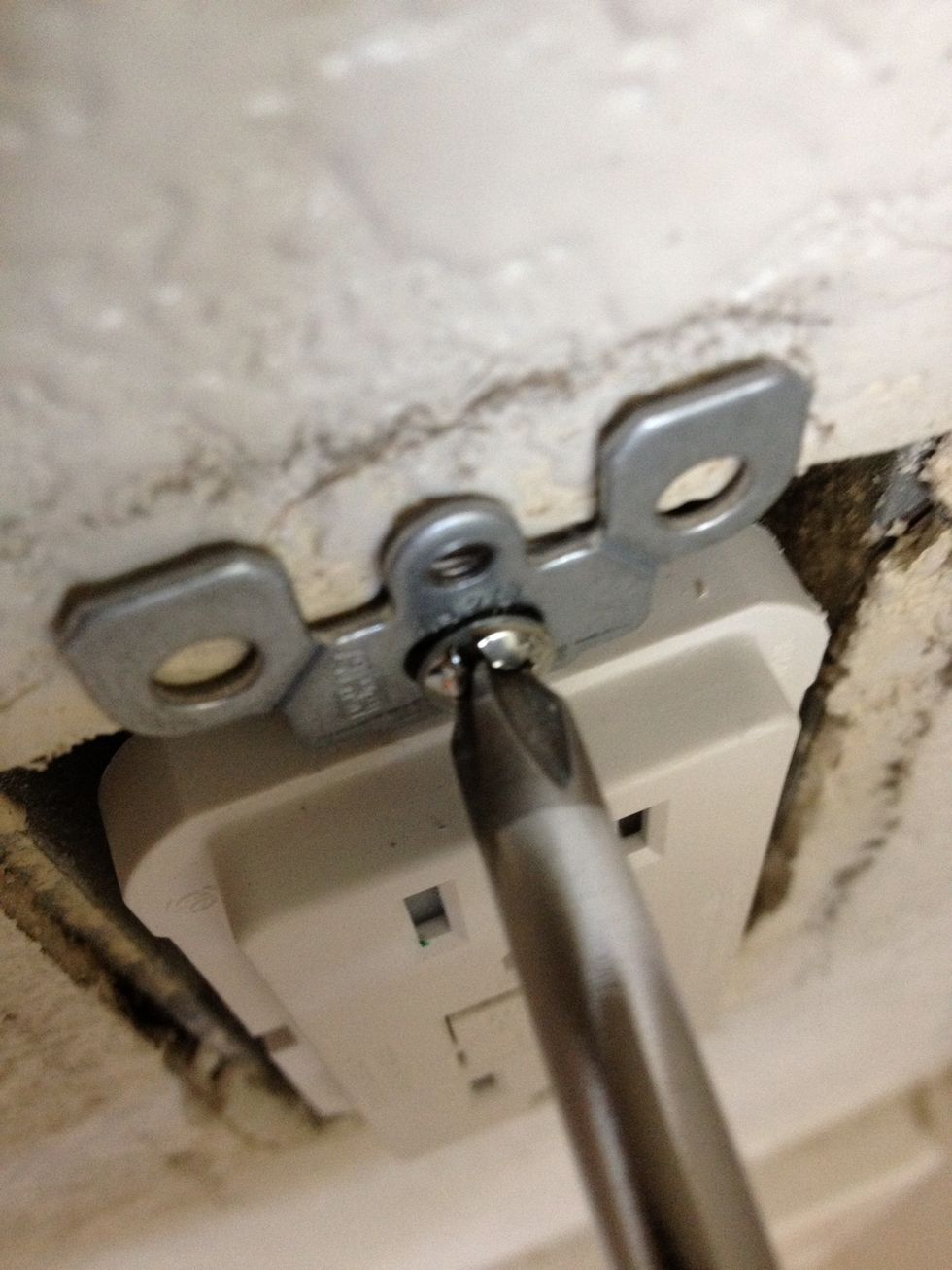You'll want to get the metal frame of the outlet right up to the drywall or J-box otherwise it will move around easily and feel unsupported. Try and get the outlet as straight and level as possible.