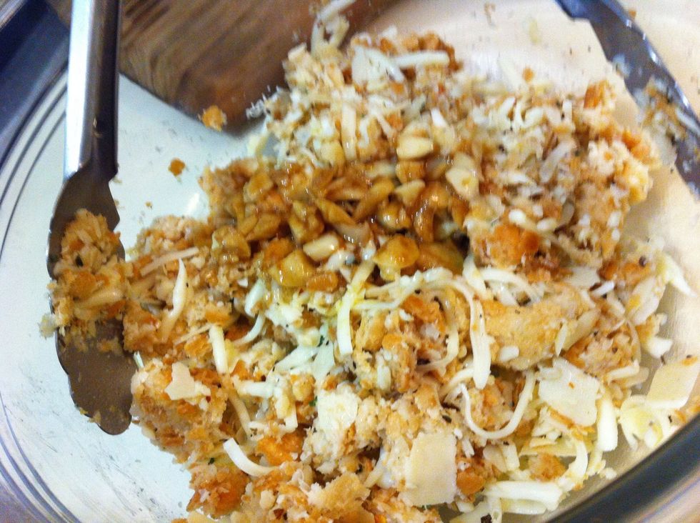 You'll want to let the garlic cool before mixing in with your mixture as you don't want it to melt the cheese and clump together