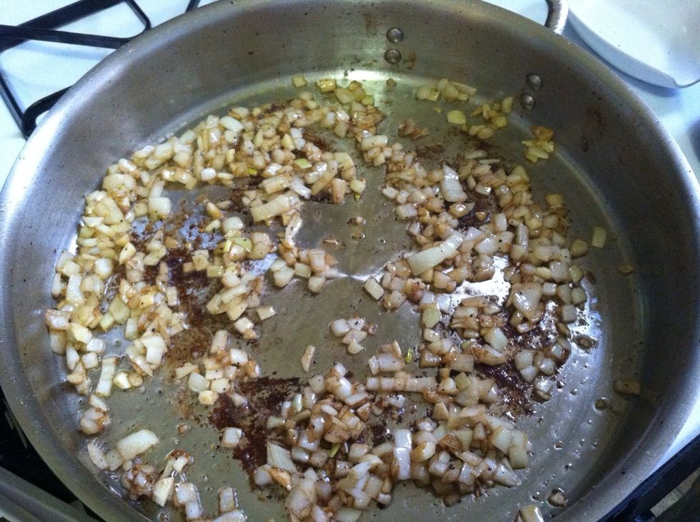 You'll want your onion and garlic to be softened, but be careful not to burn it. While saut\u00e9ing, use a wooden spoon to scrape up all of the brown bits from the pan.