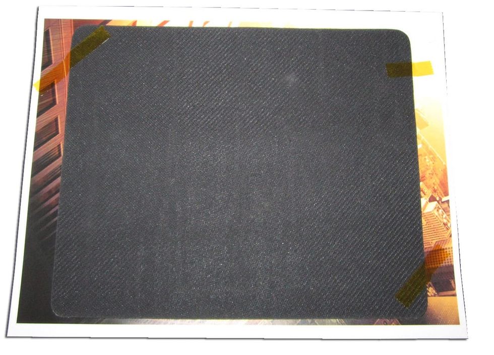 You may begin with the mousepad on top of the image and tape the mousepad to the transfer paper to ensure the image is properly aligned.