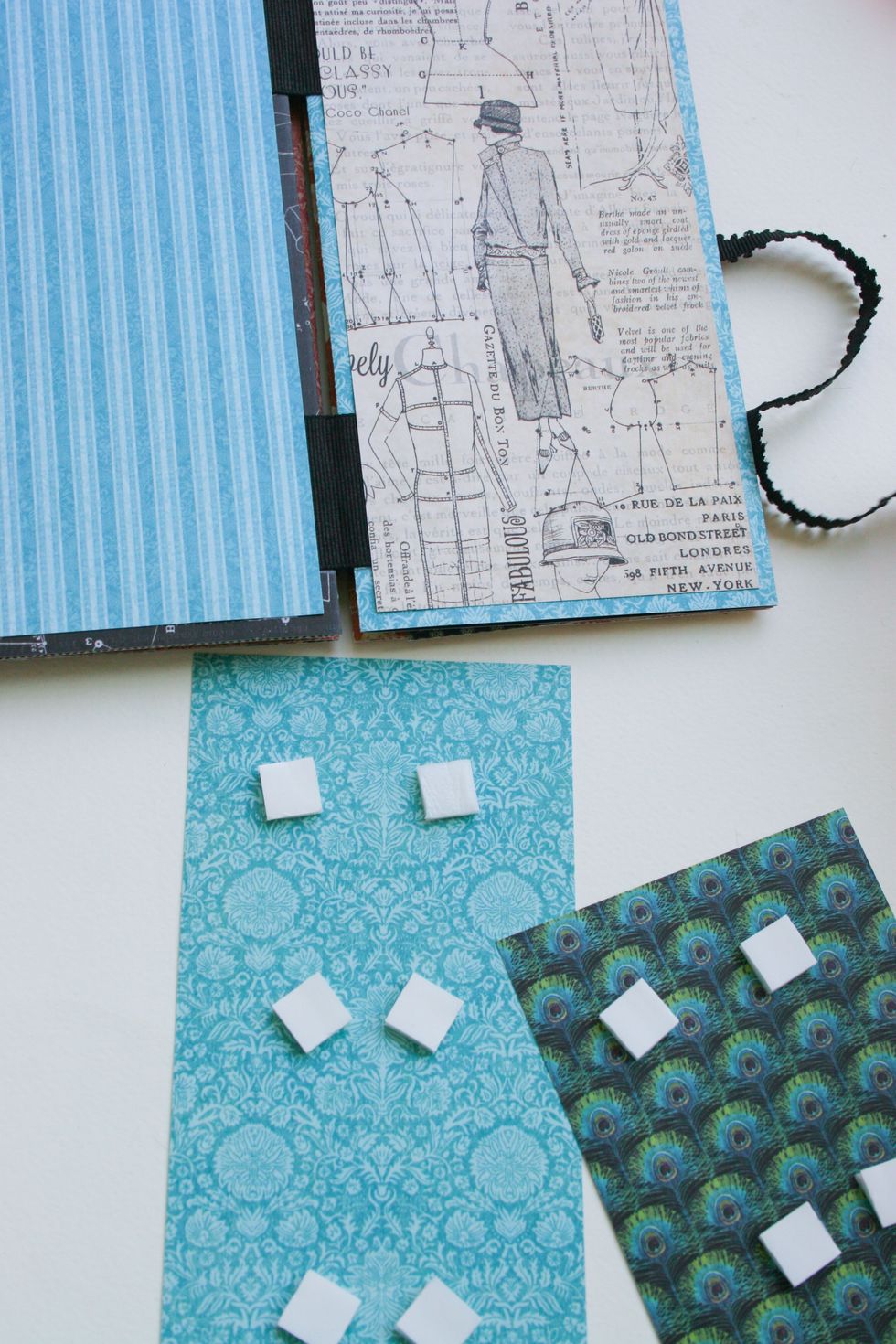 You may do it in the album too - just  cut paper details smaller, than previous layer! Volume-volume-volume!