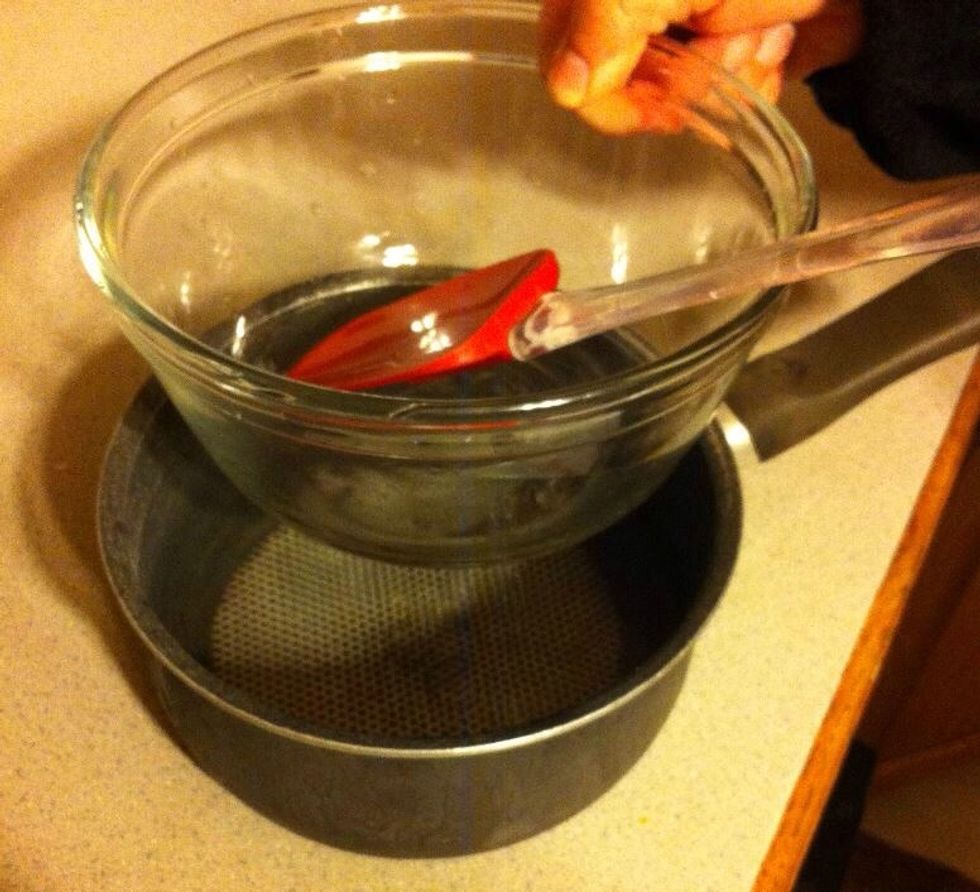 You may melt the chocolate one of two ways; through the microwave or by tempering. If you don't know how to temper chocolate I would recommend melting in the microwave, it is much easier and faster.