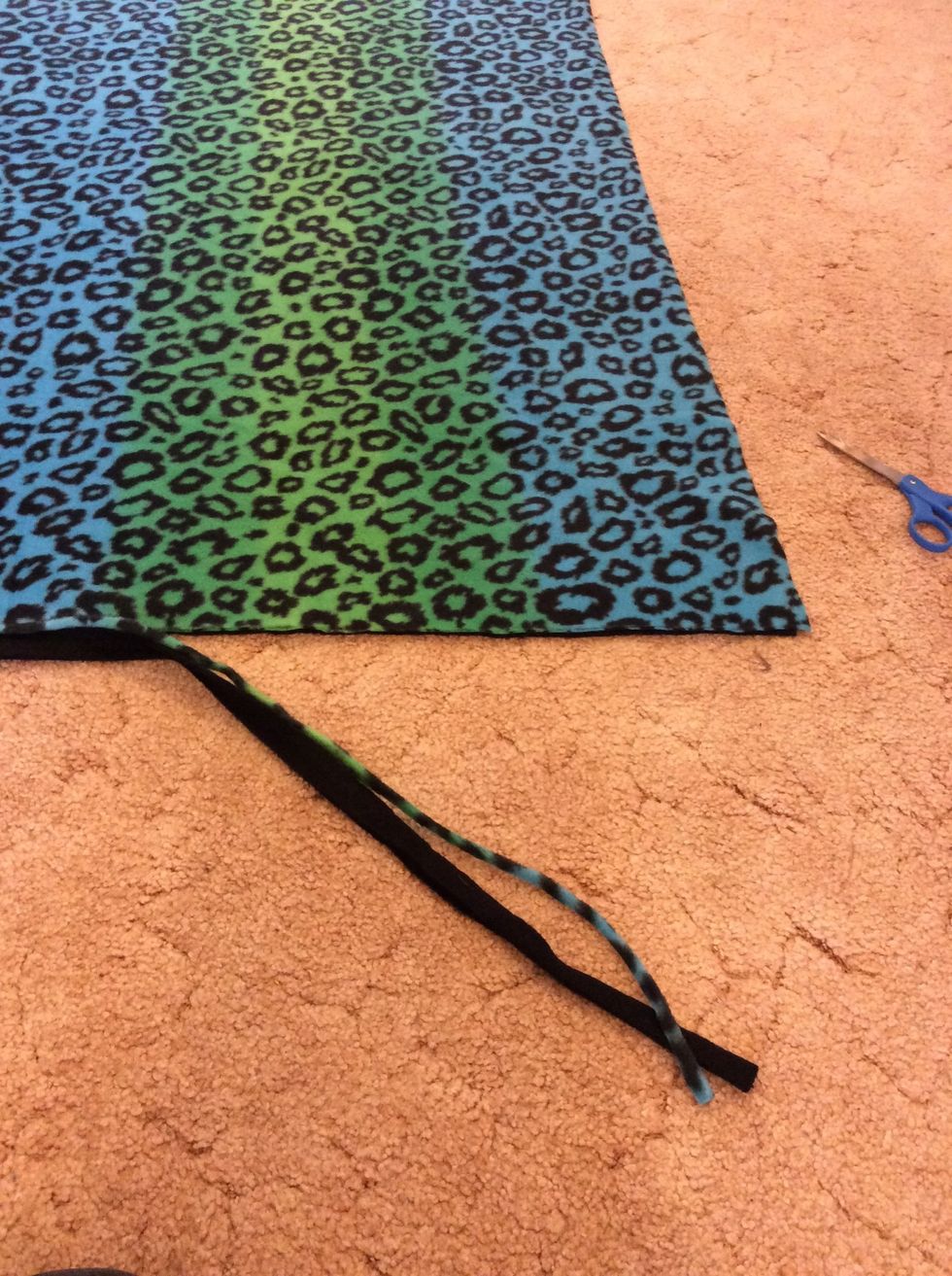 You may need to cut the sides so the fabrics are even with one another.