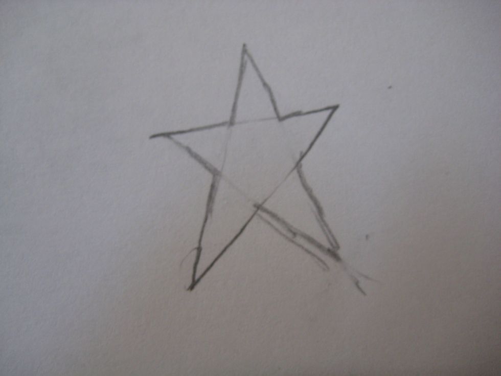 You may notice that some of the outside was also erased, so retrace the outside of your star.