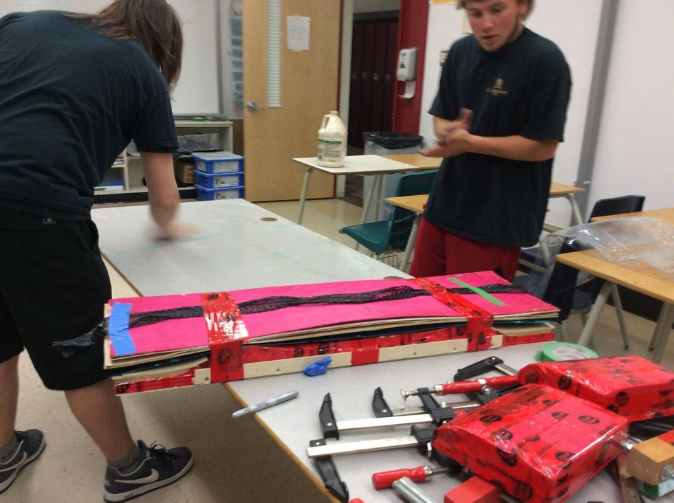 You must tape each end of the breather net to the board so that it does not move when in the bag. Then using TuckTape tightly tape the board against the molding.