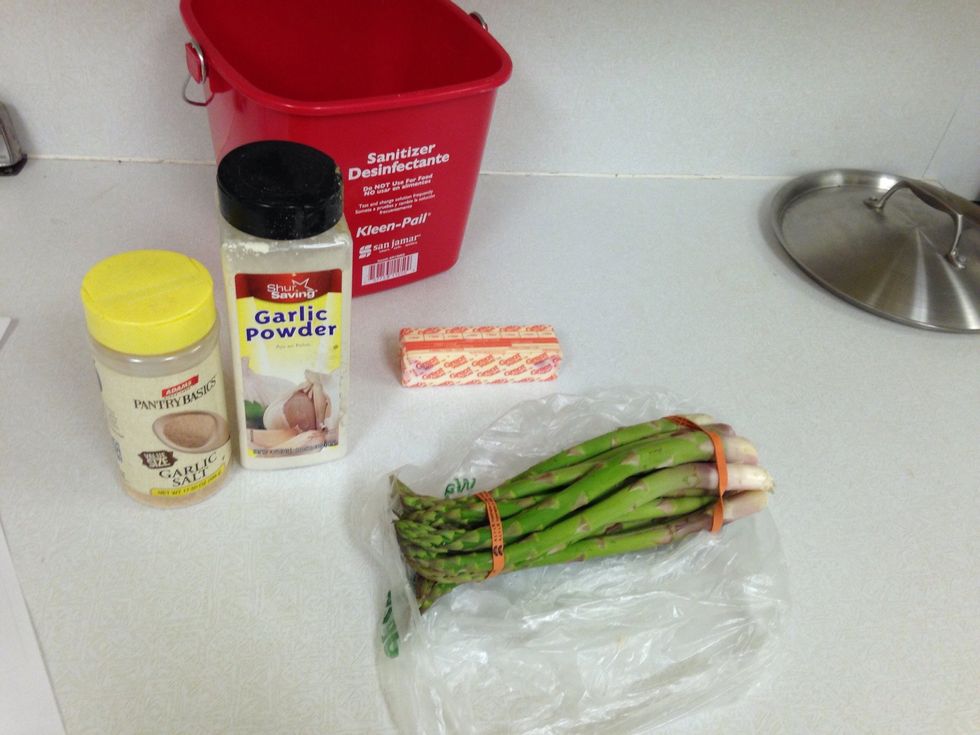 You need 3 tablespoons butter or margarine, 1 bunch of fresh asparagus, & 3 cloves of garlic/chopped