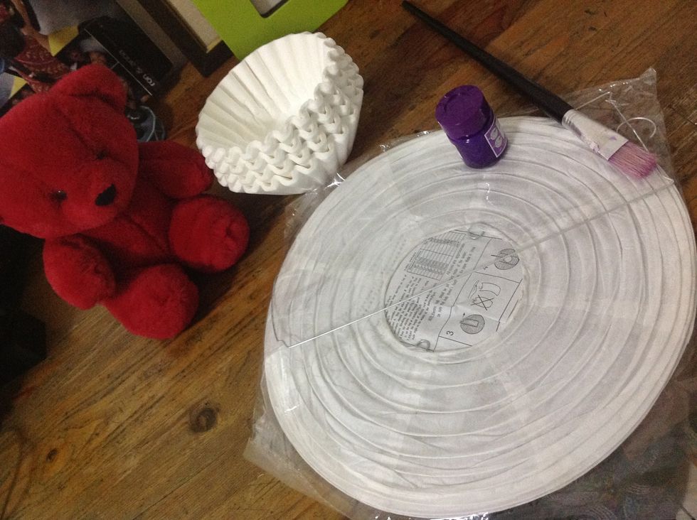 You need a 16-inch diameter paper lantern (Choose your preferred size), a pack of 200 pcs of basket type coffee filters (you'll need more for a larger lantern), a jar of poster paint.