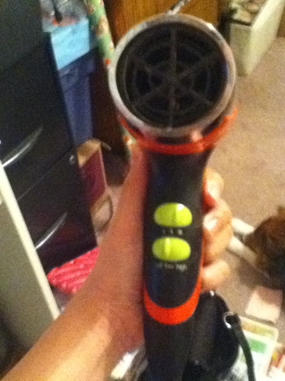 You need a blow dryer.To dry the wet hair that you sprayed with the water bottle.