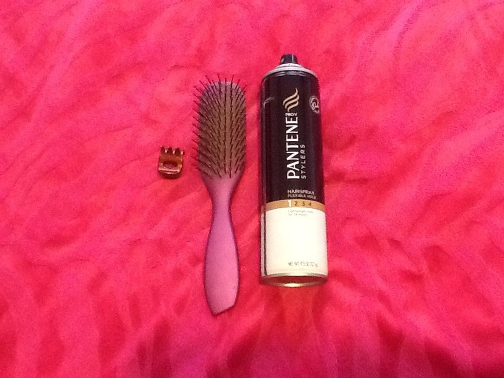 You need a clip, a brush, and hair spray