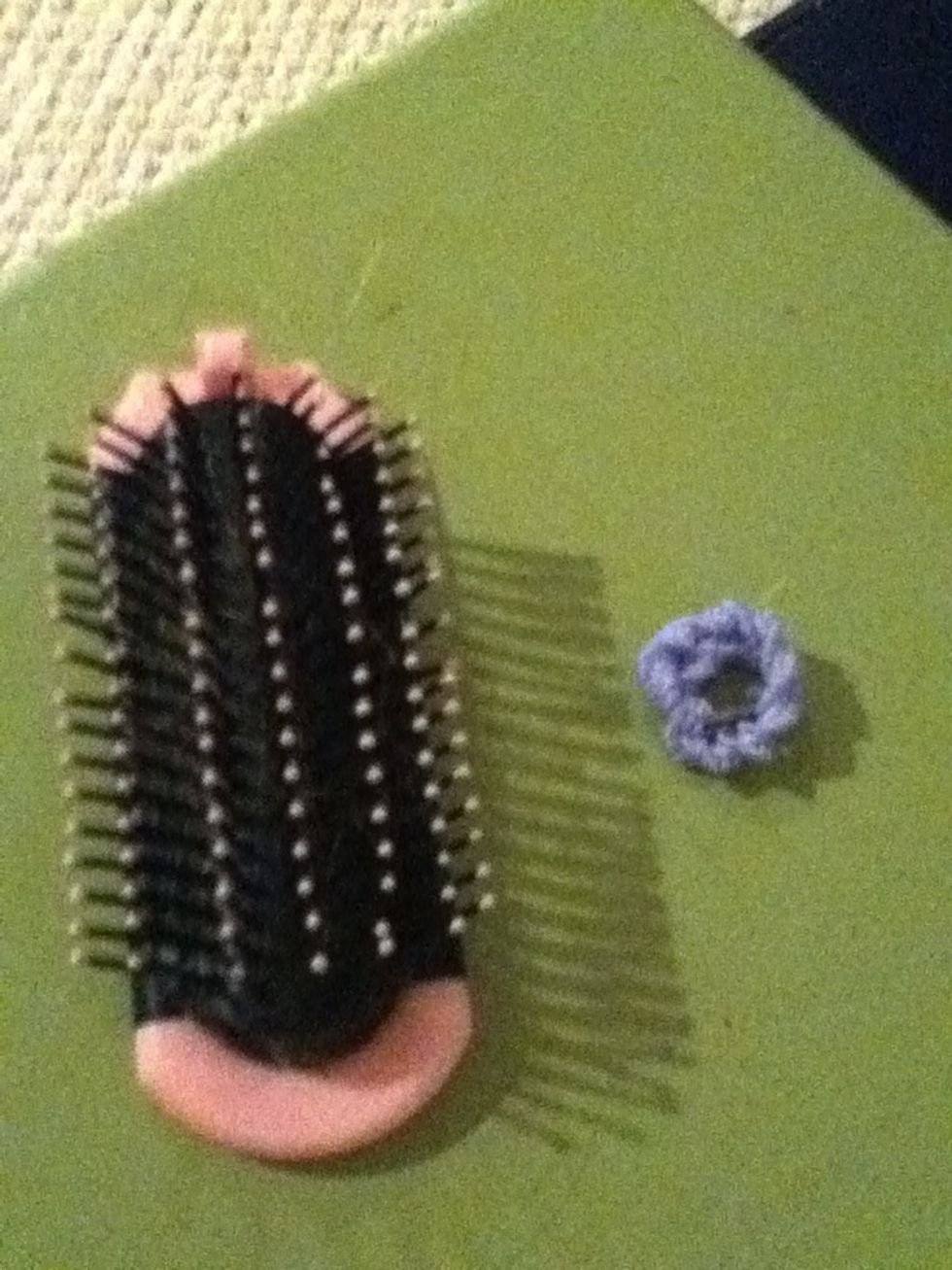 You need a hairbrush and a hair tie