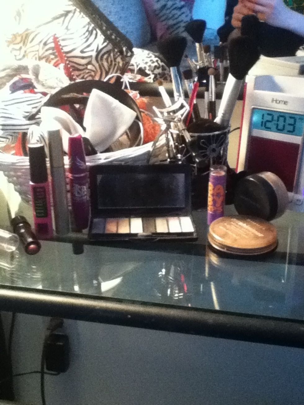 You need a light eye base, alittle bit of bronze , Foundation, Red lipstick, Mascara,Brushes, Eyelash curler, And eyeliner!