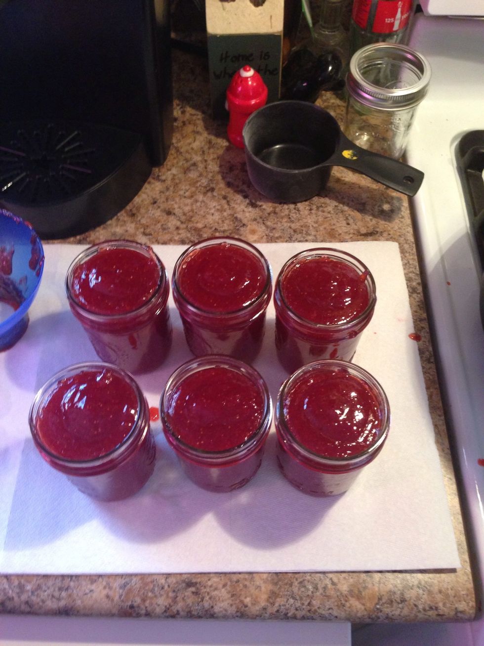 You need a wet paper towel and something to hold the hot jars with. Ove' glove works well for this.