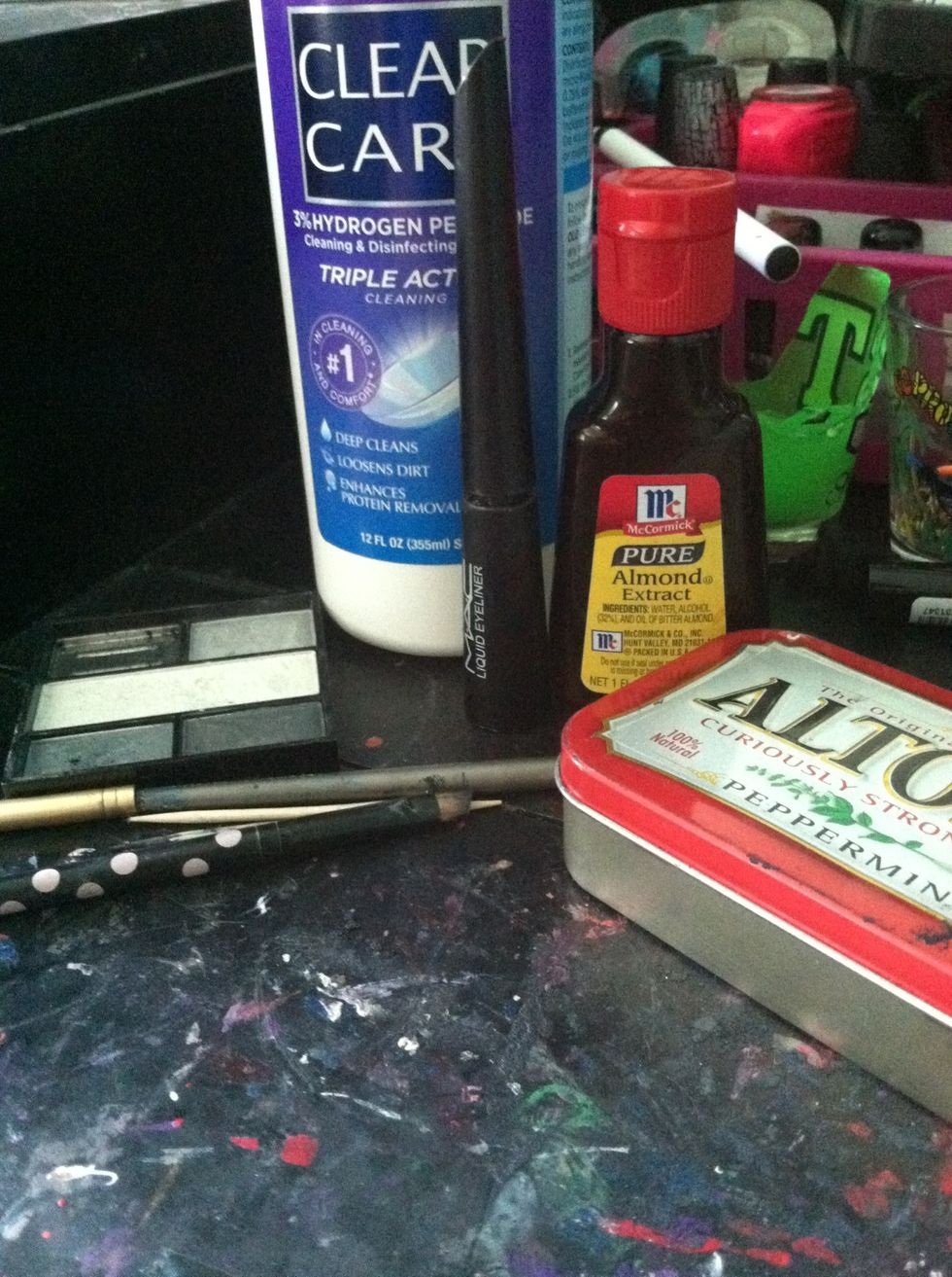 You need an eyeshadow of the color that you want your liner to be, make sure you don't mind ruining it, eye contact solution, almond extract/oil, toothpick, and make up brush