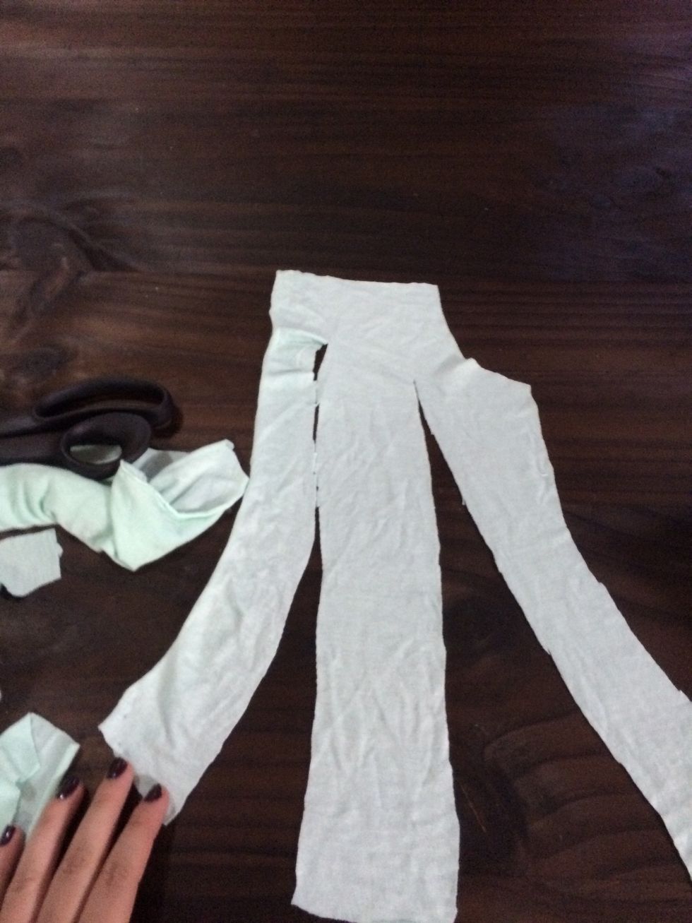 You need to cut 2 times, for having 3 pieces, it's important no to cut all the fabric, we need a little border