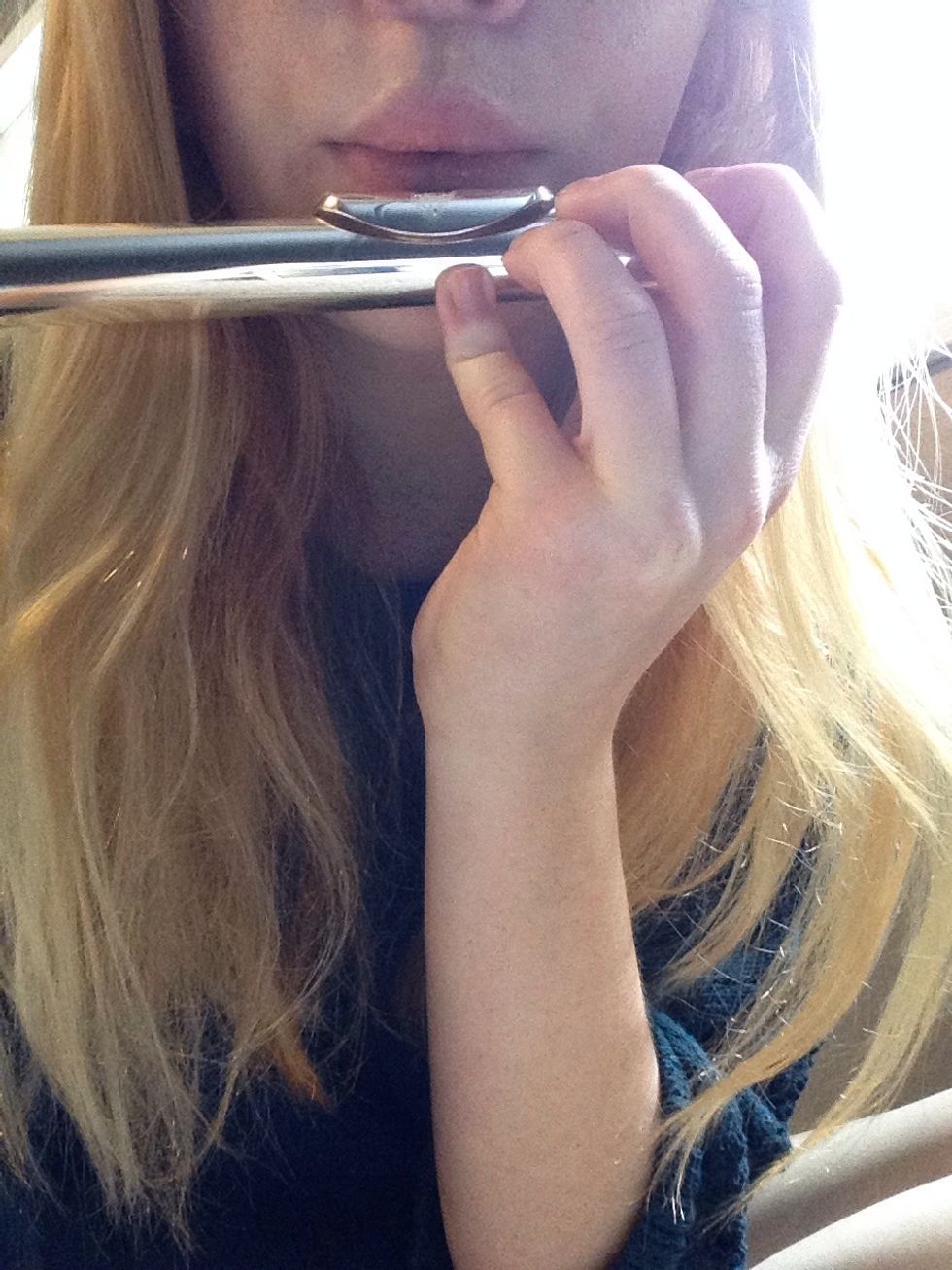 You need to have a tiny "pin hole". The pin hole determines how high or low you go. A bigger pin hole will make lower notes, and smaller the pin hole the higher the notes go