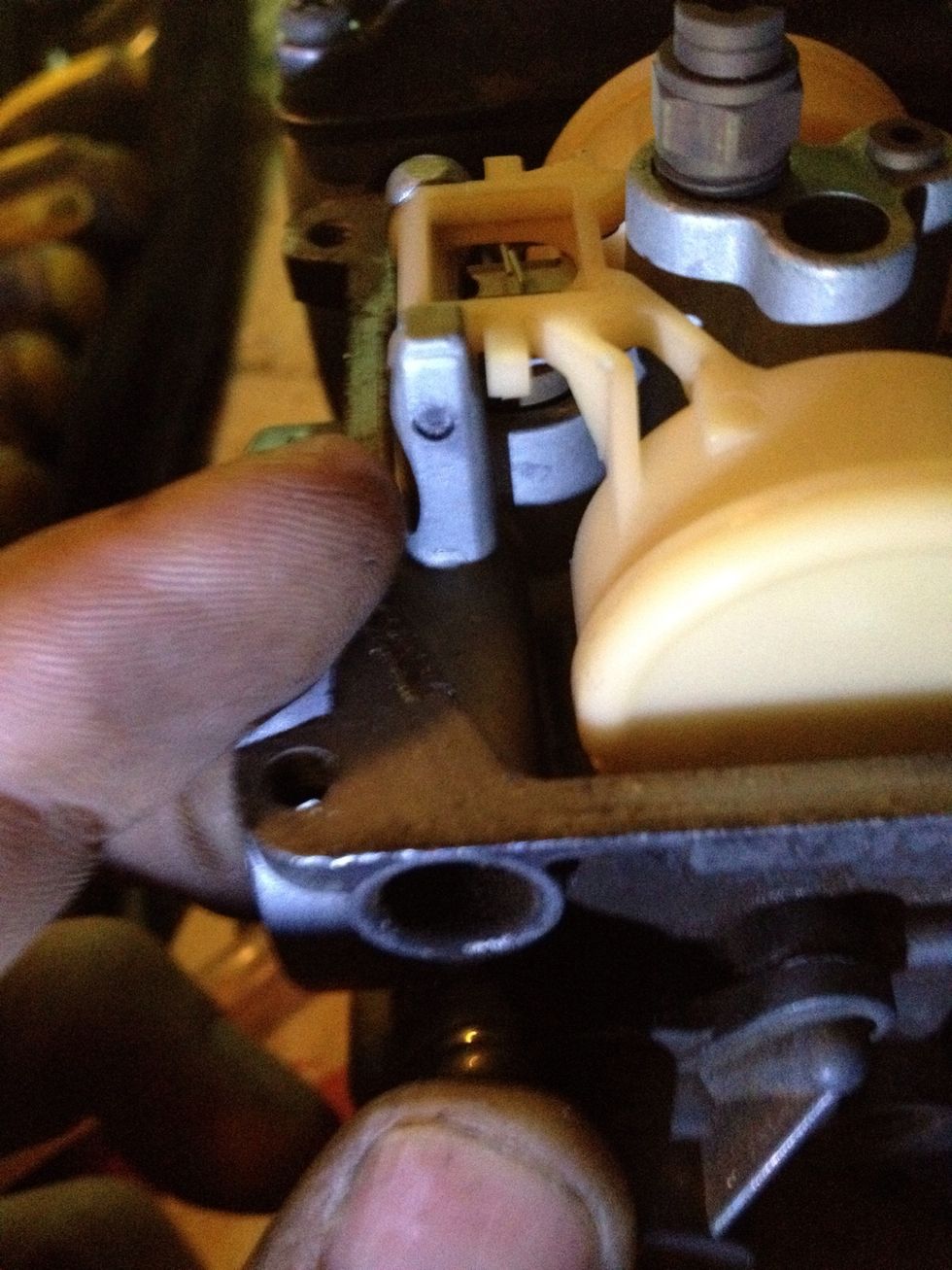 You need to push this pin out to get the float out