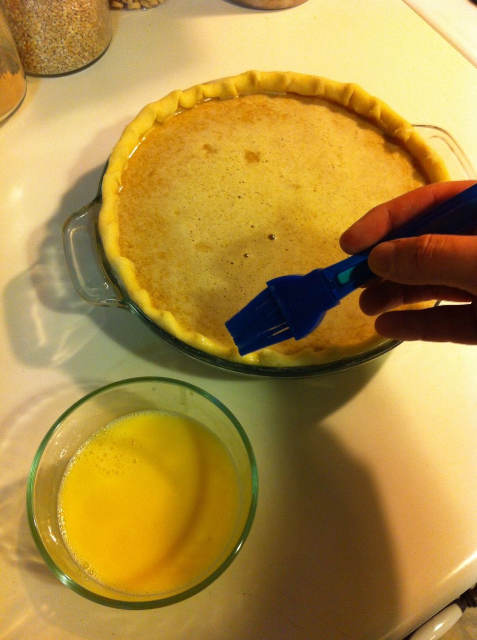 You need to spread your egg wash on the crust to help get that nice, golden crust. This step is optional, but my wife wouldn't let me cook this pie without doing it.