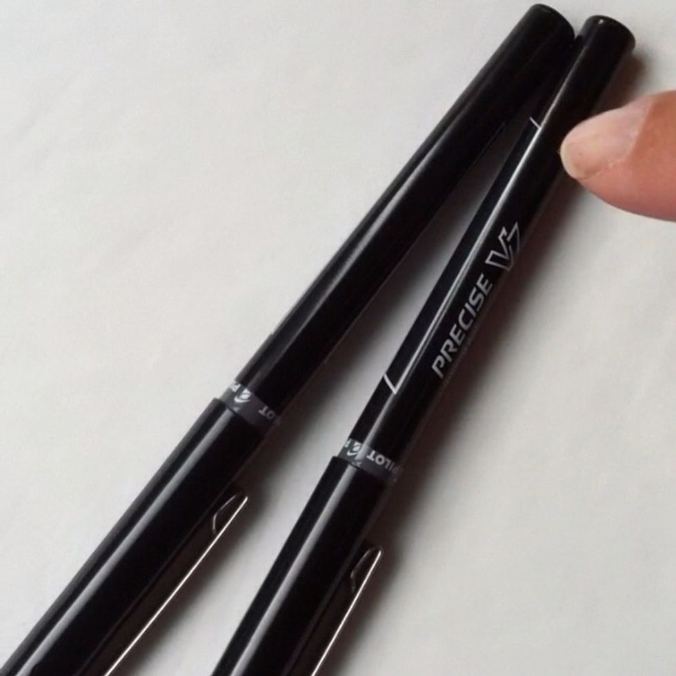 You need two pens with smooth ends.