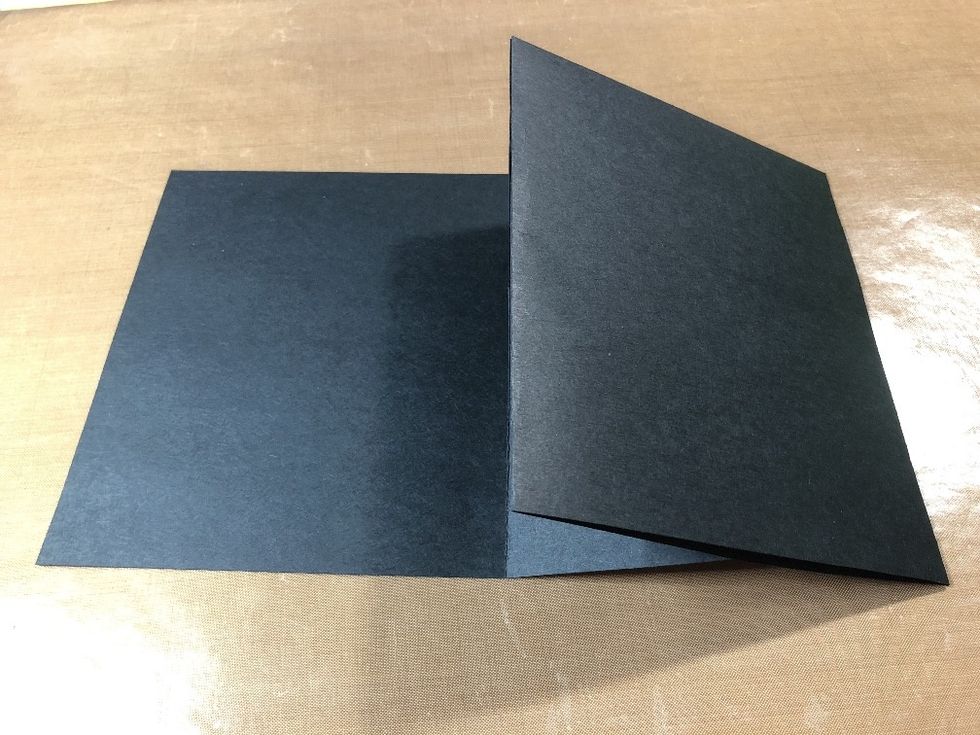 You now have a movable front panel (which is also a pocket).