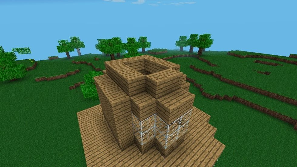 You now have to build a triangular roof like so.