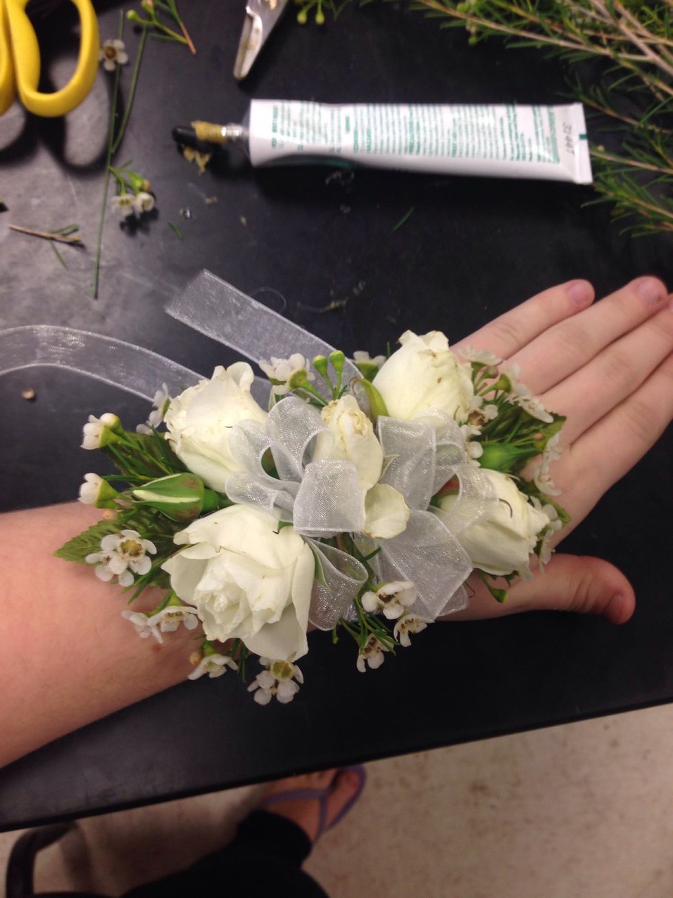 You now know how to creat your own wrist corsage for any event you'd like. Use any color flowers/bows to match the occasion (: