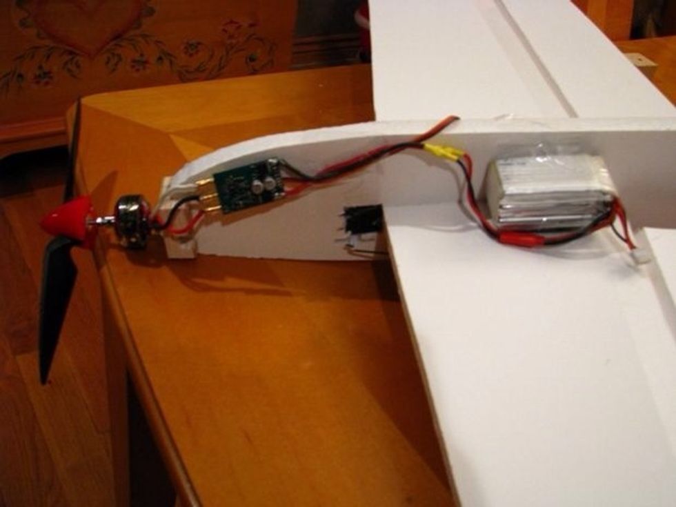 You now need to mount the ESC, Radio, and Battery. I just use tape to mount the electronics. Make sure the plane balances about 1/3 to 1/2 the wing cord length back from the leading edge of the wing