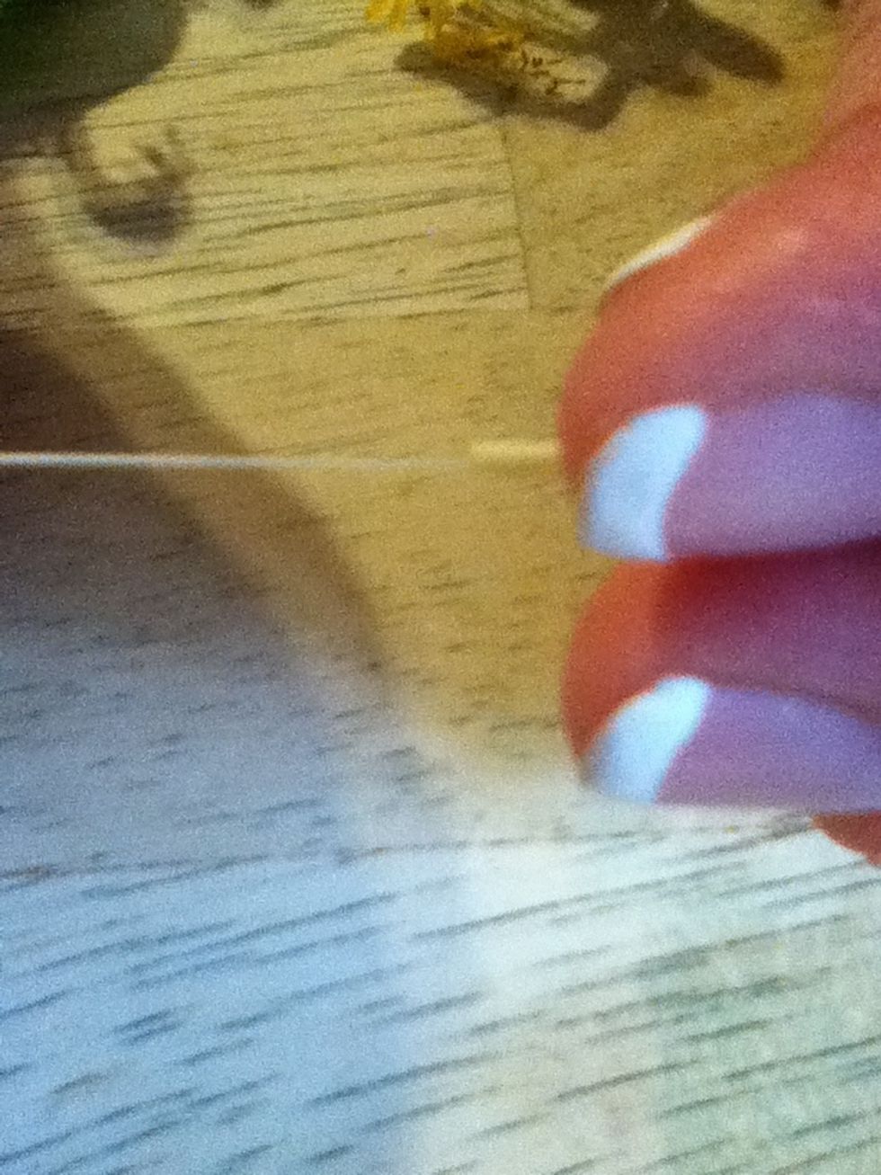 You pull on it carefully.Then their should be a drop of honey.(Nectar)