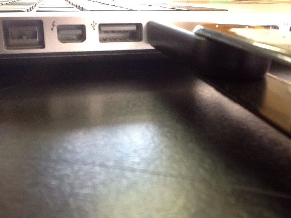 You put your USB into the USB port