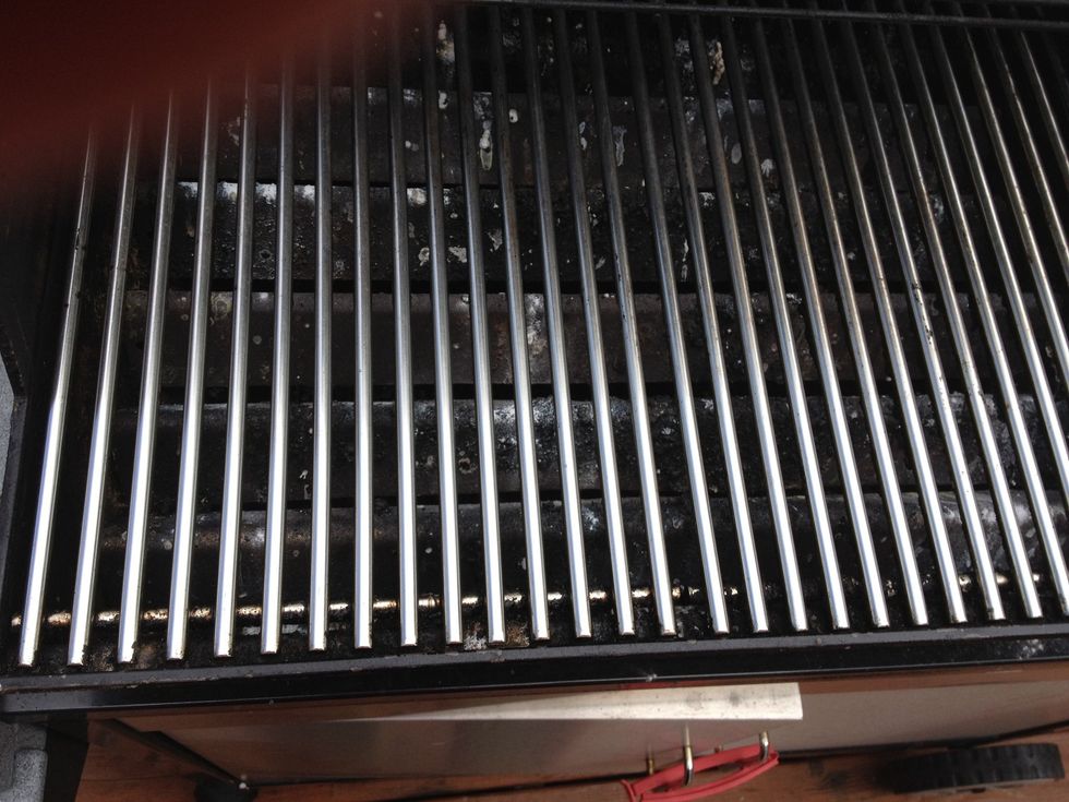 You're done! The baking soda on the burners will go away with more use, and besides, it can extinguish grease fires anyhow ;)