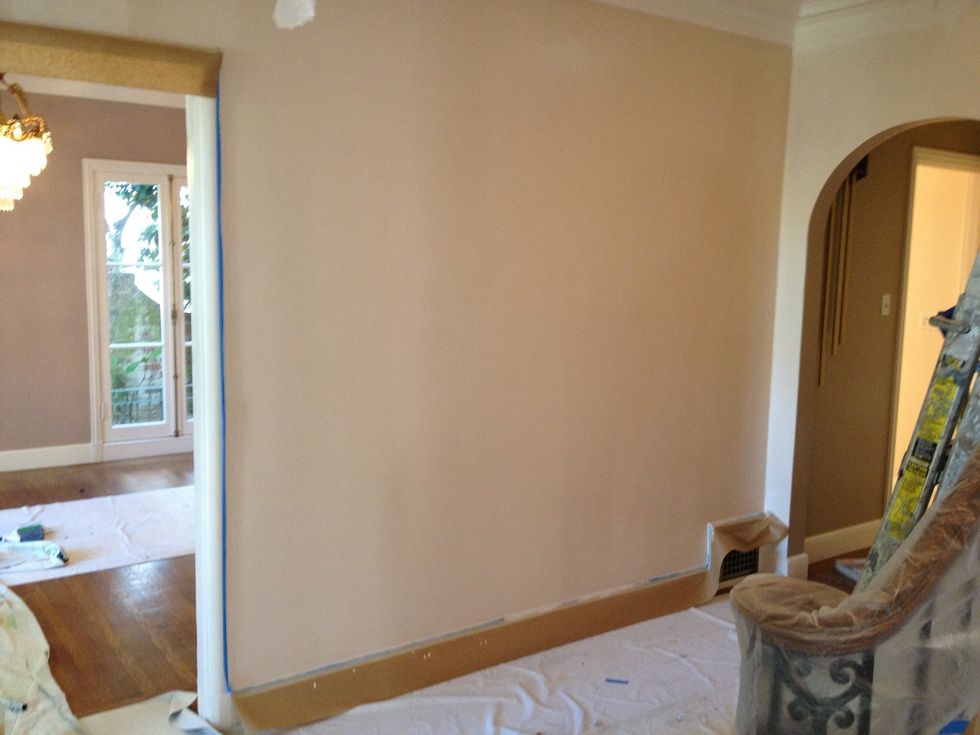 You're done with your first coat! Now repeat as needed. When the paint dries, usually 1-2 hours per coat for latex paint depending on temperature, you can remove the masking tape.