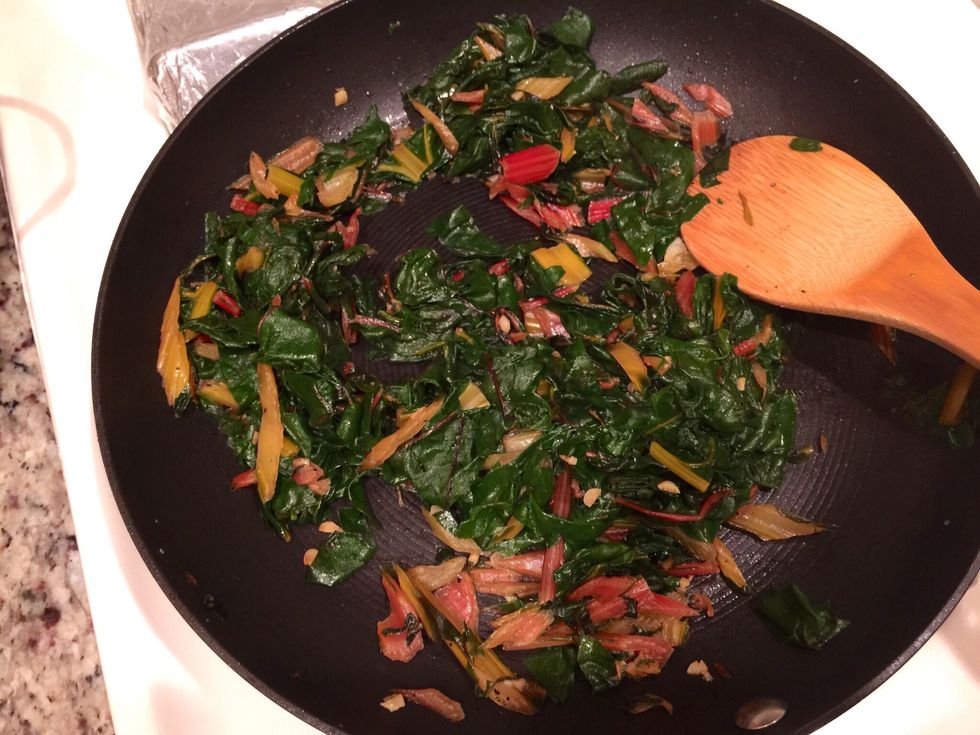 You're going to want to cook the stems first in olive oil over medium high heat in the pan, undisturbed for 3 minutes. Once cooked, add the other half of the garlic & cook.