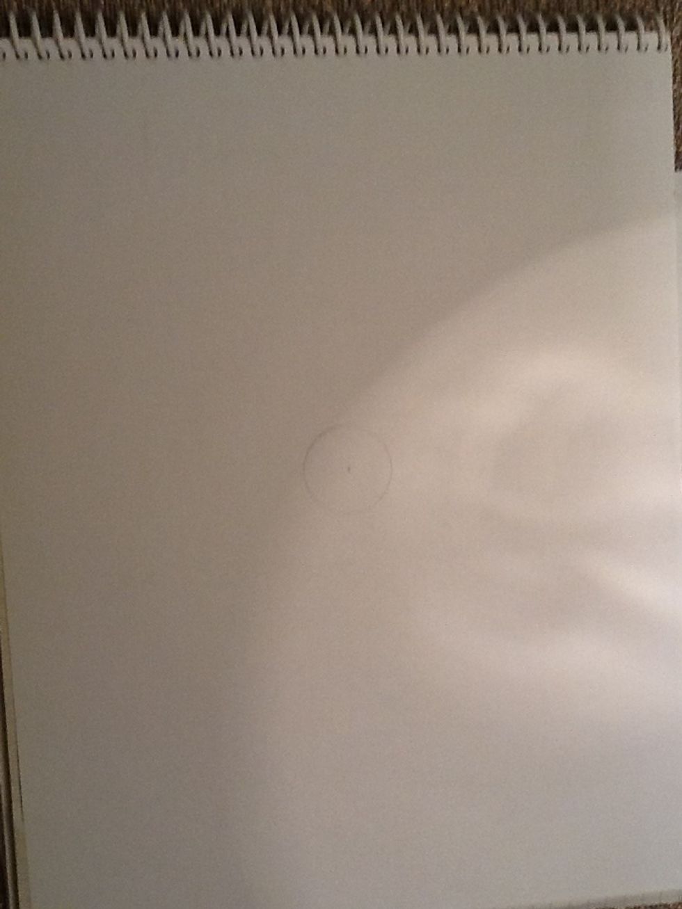 You set your compass to .5 inches, and make a circle. Your going to have to draw the circles lightly because you'll have to erase them when your done.