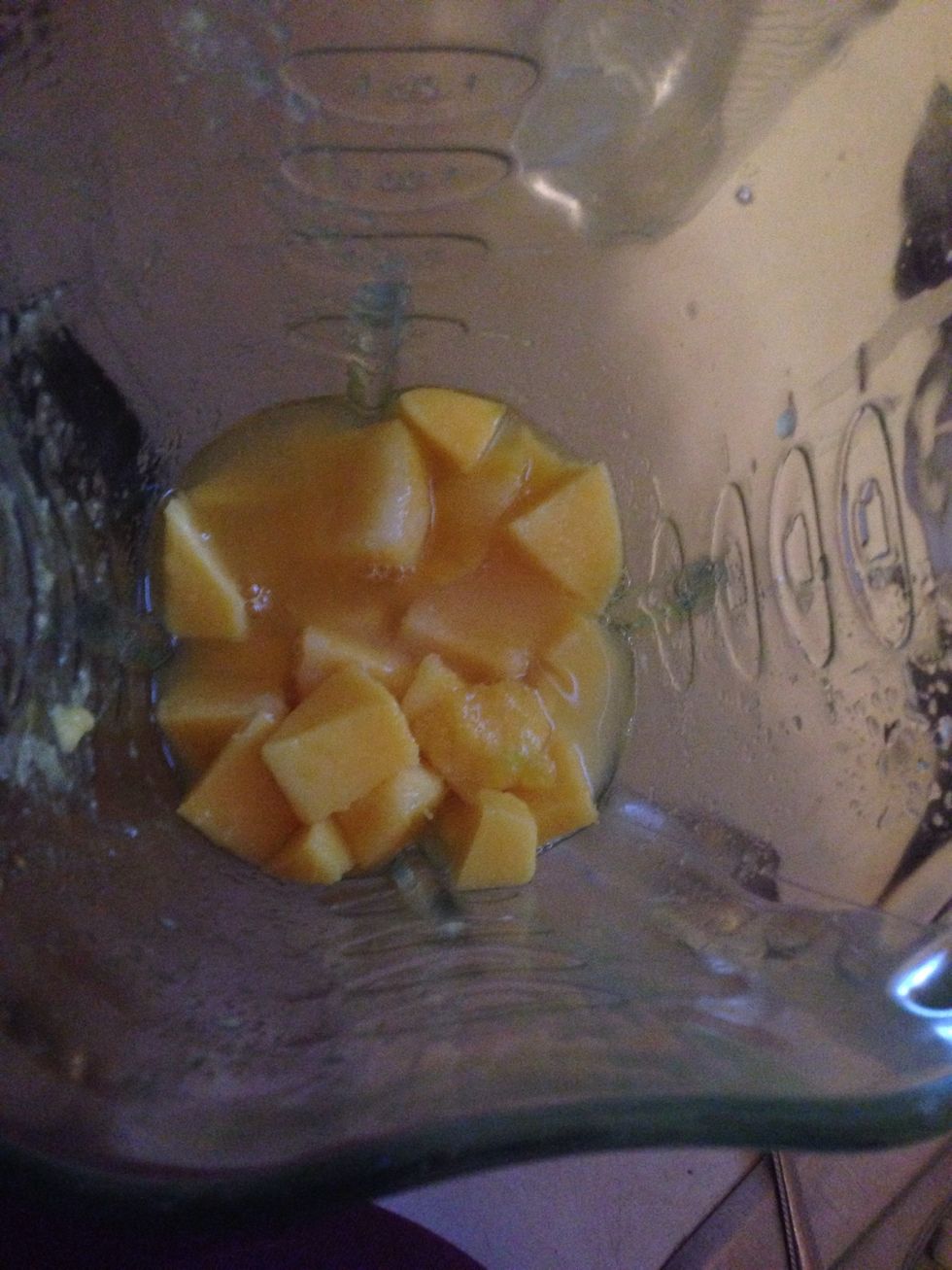 You should add about 10-15 pieces of Mango in the blender along with your 3tbsp of sugar and 1/2 cup of water.